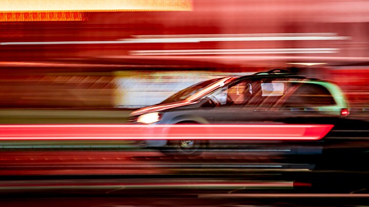 Fast moving car with light streaks