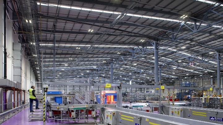 Warehouse of Royal Mail NDC illuminated by Philips Lighting industry systems