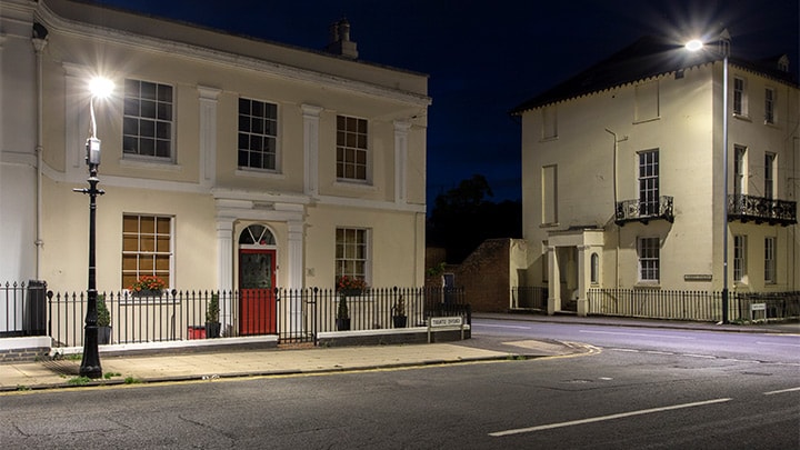 Street lights illuminating a house in Stratford-upon-Avon